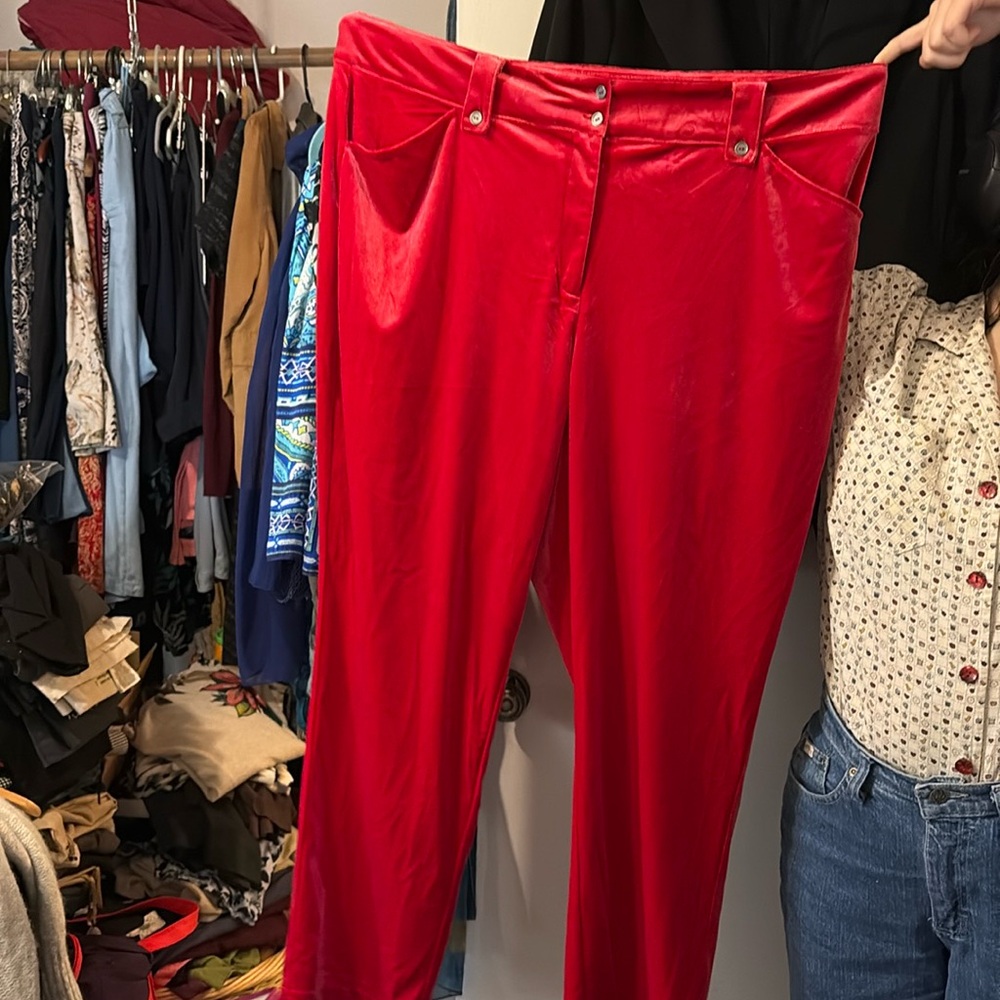 Red velvet pants rarely worn no wear between the legs. Like new.